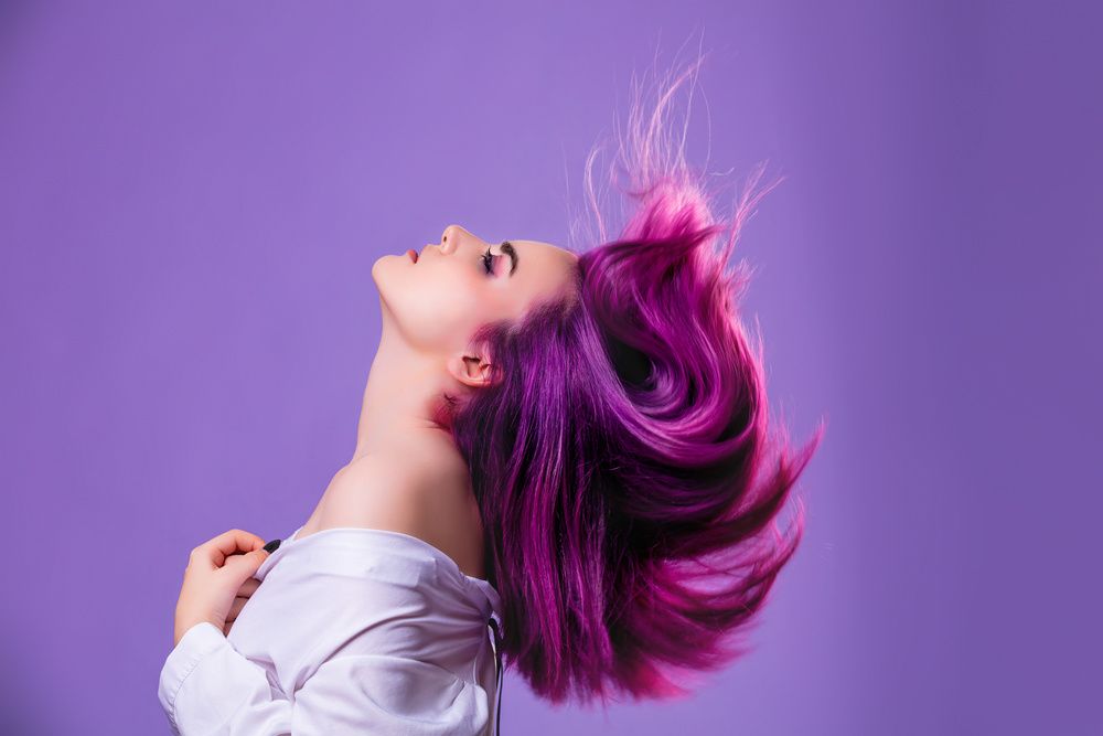 Women with beautiful hair dyed in purple